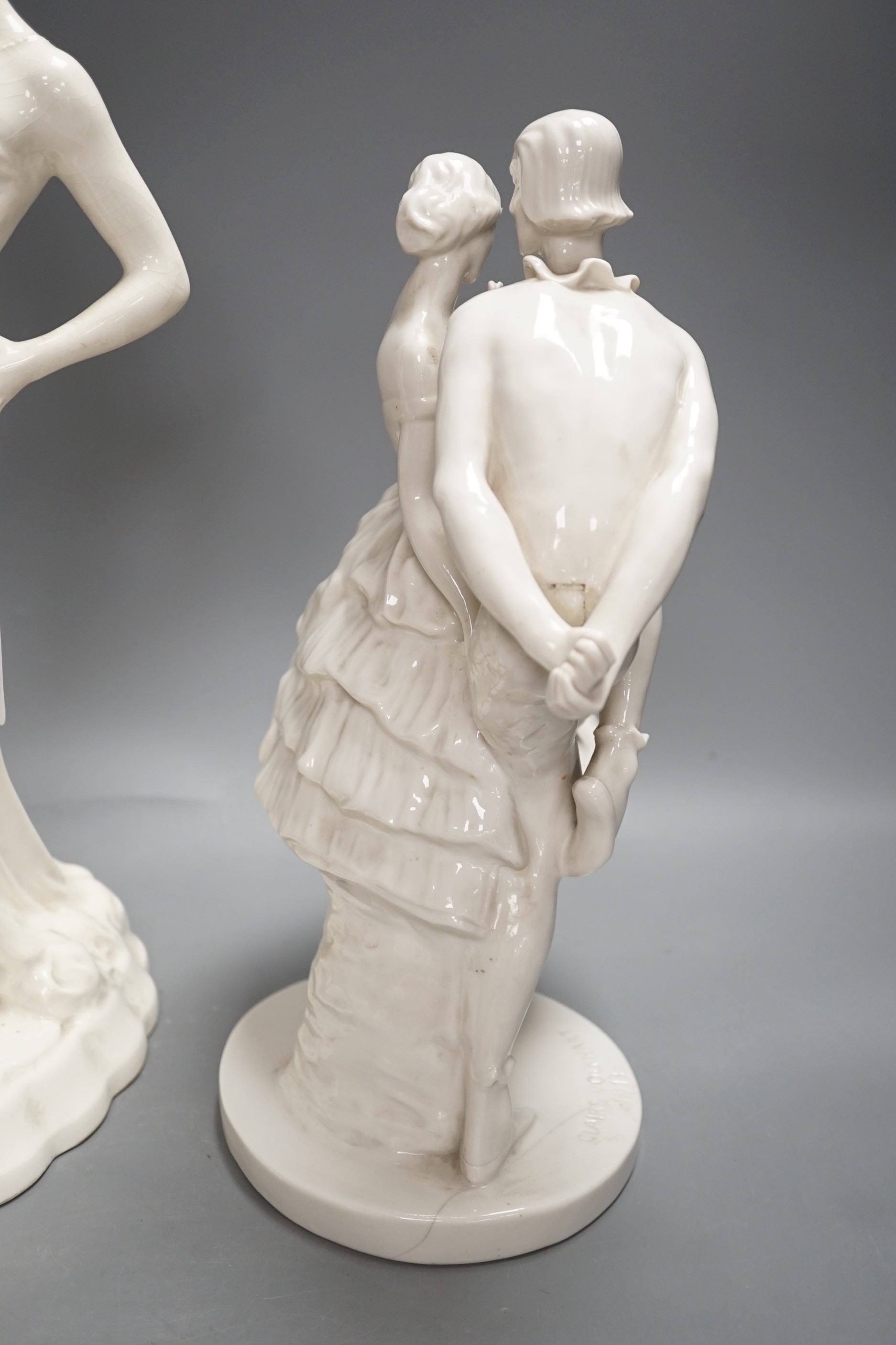 A Royal Dux Art Deco white glazed group modelled as a flapper with two greyhounds, no. 14212, and a Schwarzberger Werkstatten for Porzellankunst group modelled by Claire Volkhart Tallest 41cm